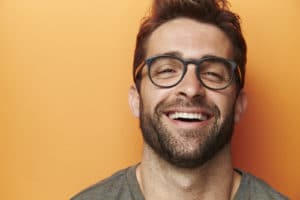 man smiling with invisalign 