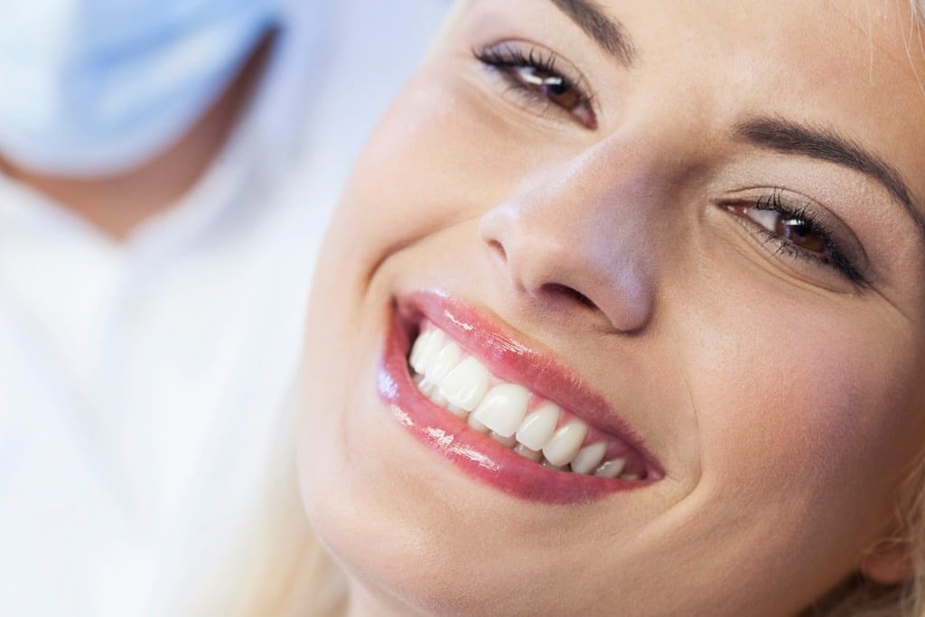 happy smiling women after prosthetic dentistry dr. steven holbrook albuquerque, nm