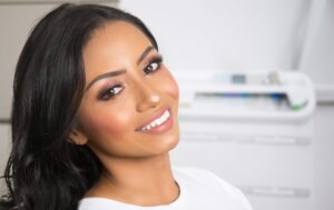 Beautiful Latina woman has great looking teeth following cosmetic dentistry treatments in Albuquerque