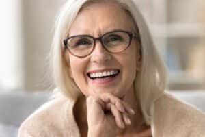 Mature woman maintains a nice smile with help from a dental implant