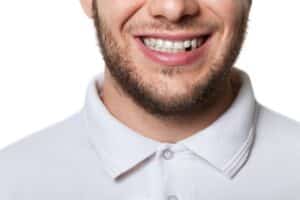 Man has a missing lower tooth he should replace.